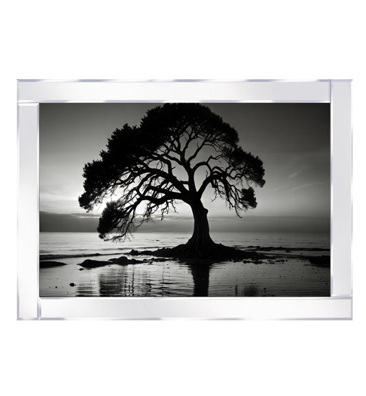 Mirrored tree stands by the lake, illuminated under the night sky