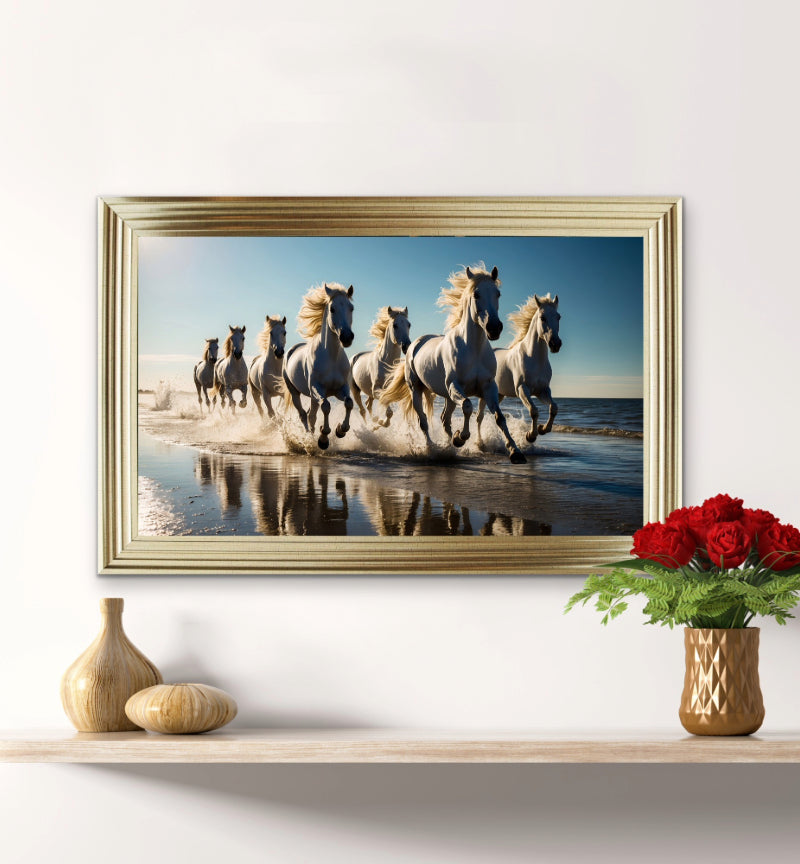 Seven white horses running along the shoreline
